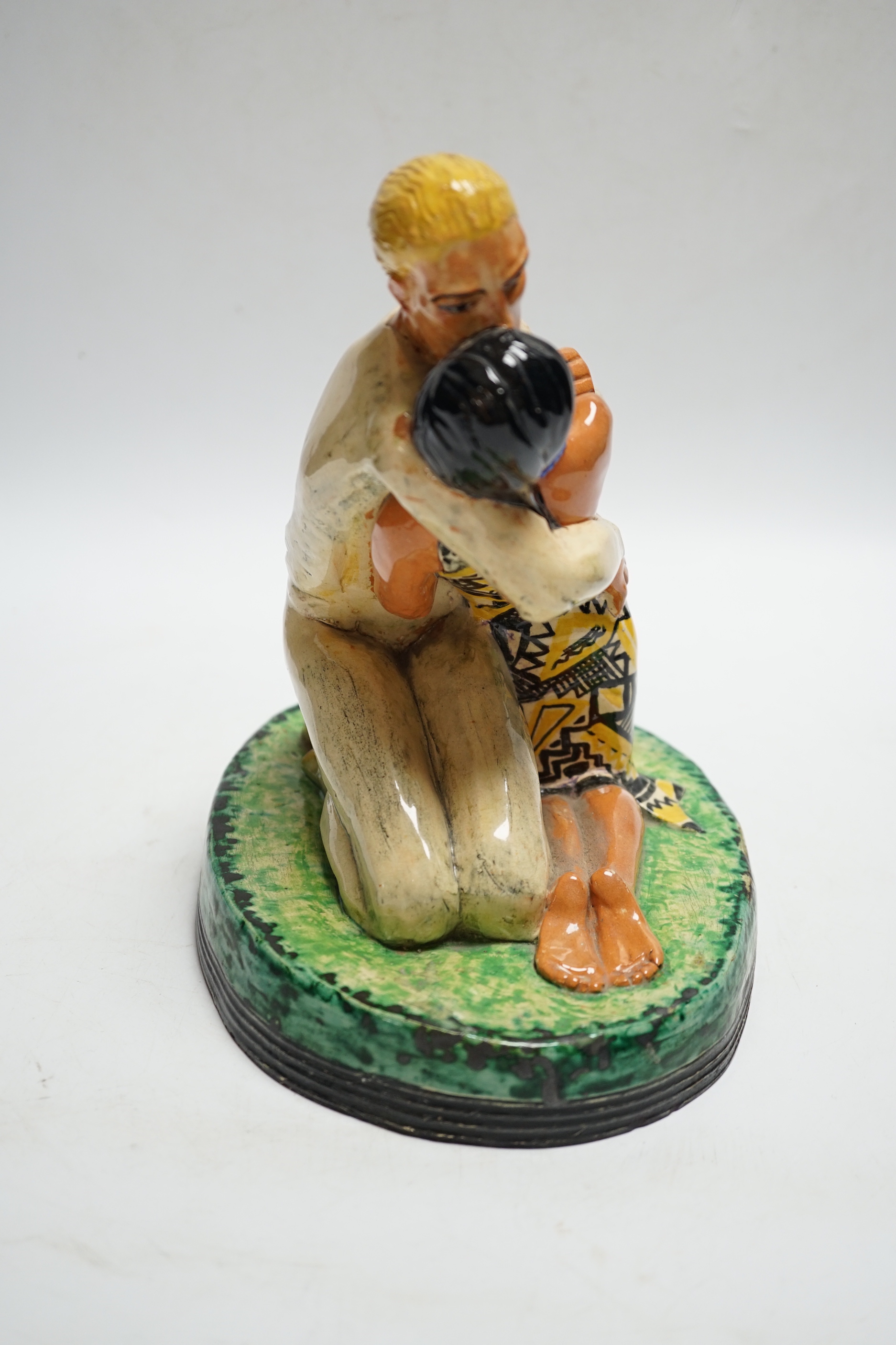 Dunstan Ford Smith, dated 1926, a pottery figure group, 21cm high